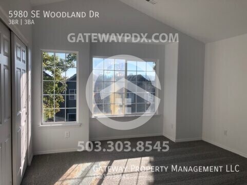 Building Photo - 5980 SE Woodland Dr