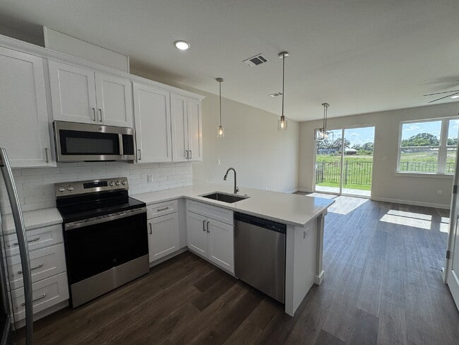 Building Photo - Upgrade your living experience across from...