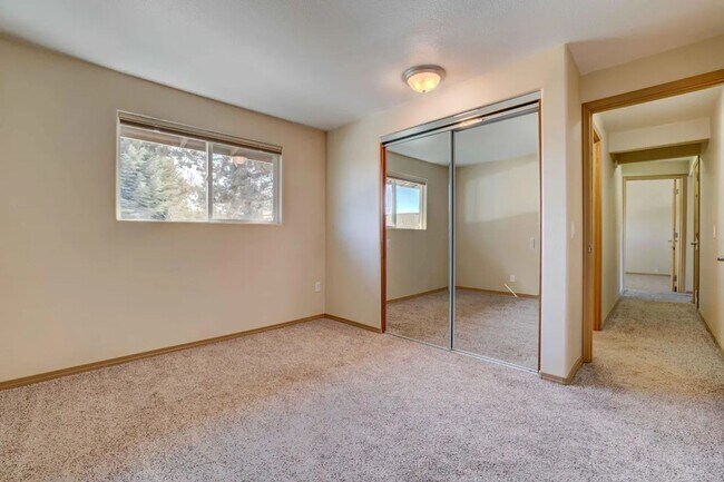 Building Photo - 1/2 acre in the with RV Hook ups