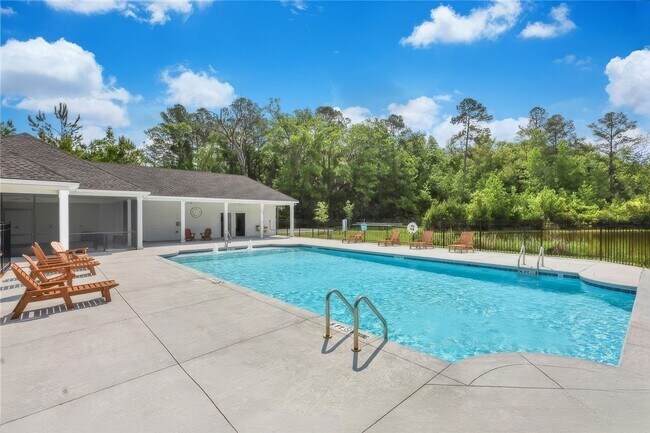 Building Photo - Highly Desirable 4 Bedroom Home with Serene Cul-de-Sac Living in Watergrass Community