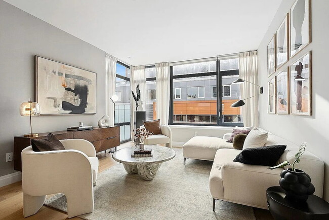 Building Photo - "Luxury 1-Bedroom Oasis with Pool & Elegant Finishes in Prime New York Location!"