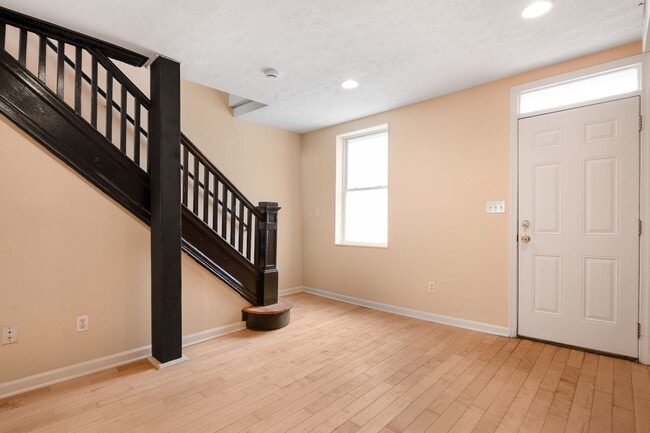 Building Photo - Spacious 2BR/2.5BA Townhome with Finished Basement & Extra Storage