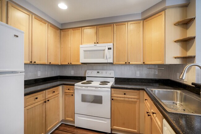 Building Photo - Starter 2 Bedroom with Dedicated Parking Space