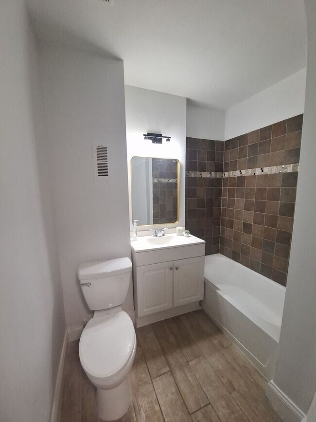 Building Photo - Historic Charm Meets Modern Comfort: 2BR Baltimore Townhouse with Private Yard