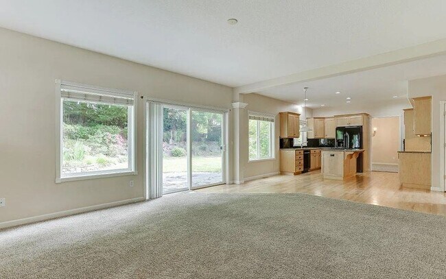 Building Photo - Spacious Four-Bedroom Home with Gourmet Kitchen, Multiple Living Areas, Loft, and Beautifully Lan...