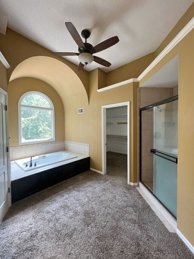 Building Photo - COMING SOON: Spacious 4-Bed Home with Fini...