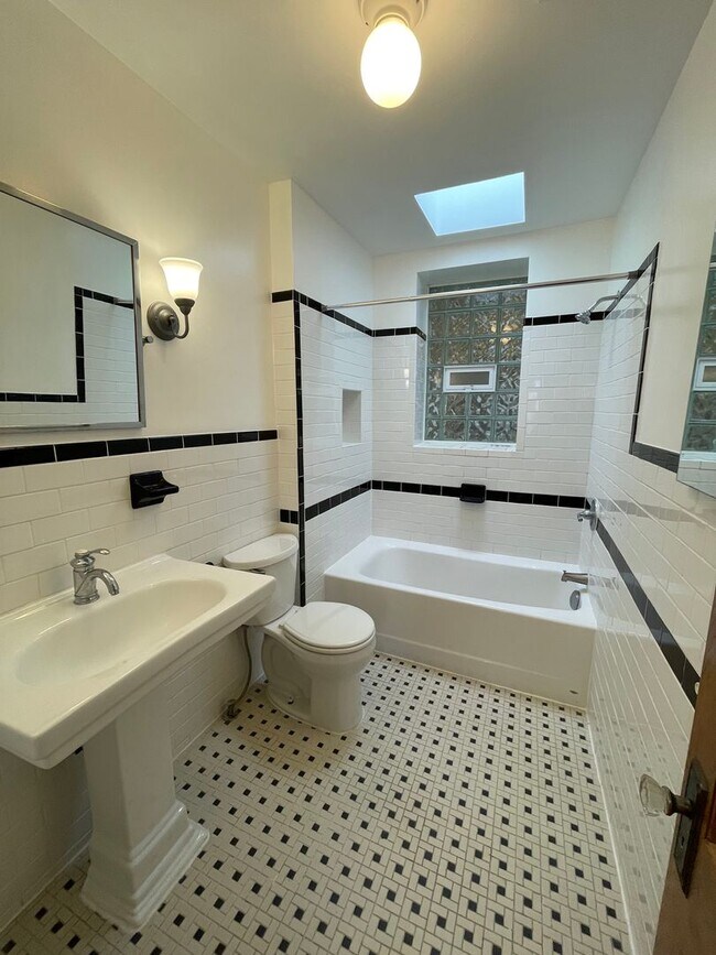 Building Photo - Charming 1928 Row Home for Rent with Modern Amenities — 3 Bedroom 2 Full Bath w/ 2 Half Baths, 2 ...