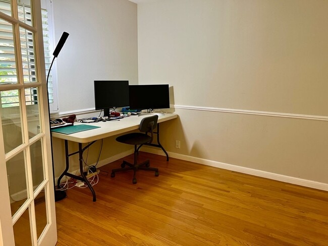 Building Photo - Great Natural light, Treetop Views with 2 Primary Suites plus OFFICE and a 2 car garage, It is li...