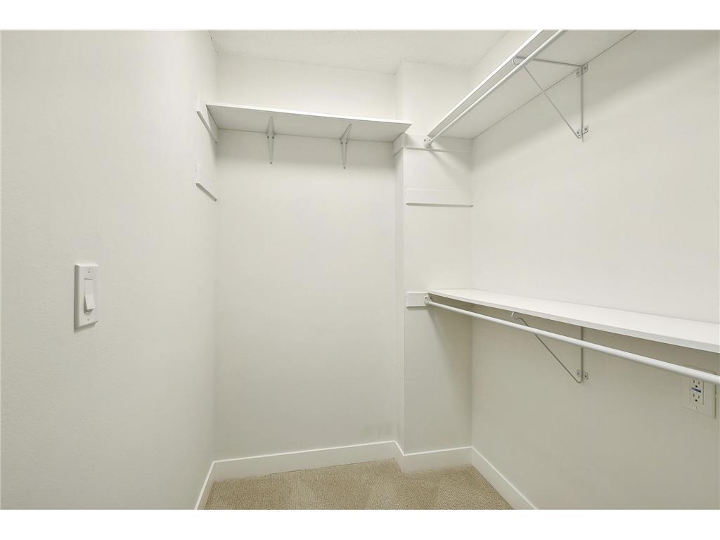 Walk in Closet in primary bedroom - 7520 Cahill Rd