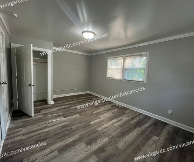 Building Photo - 6065 E 6th Pl