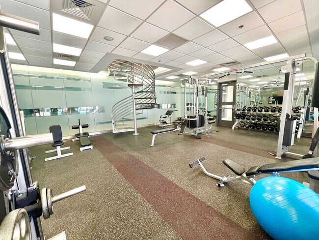 Building Photo - Spacious 2 Bedroom High-Rise Condo with Resort-Style Amenities & Oversized Balcony