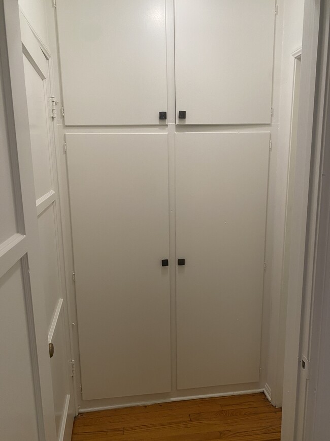 Hallway closet with storage above. - 1857 Pandora Ave