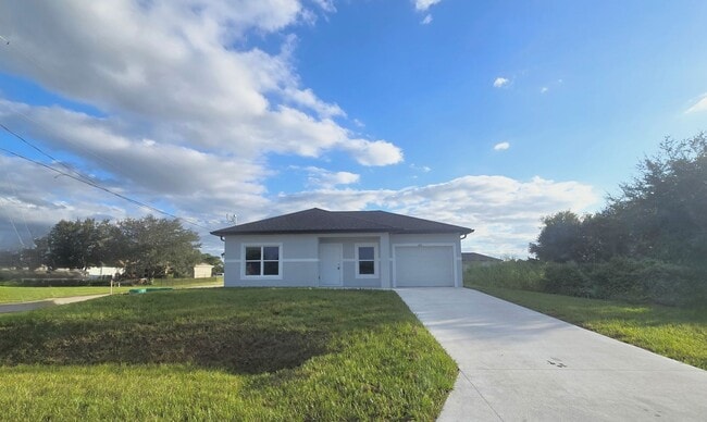 Building Photo - Brand-New 2/2/1 -SW Lehigh Acres-See this ...