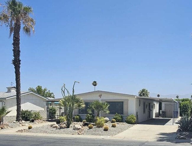 Building Photo - 73185 Palm Greens Pkwy