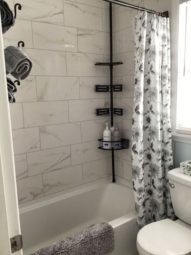 Building Photo - 6+ MONTH RENTAL-Temporarily discounted to ...