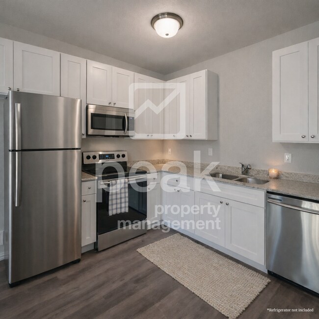 Building Photo - $1425! Stylish 2BR Townhome. Apply by 2/11 for 1425 free!