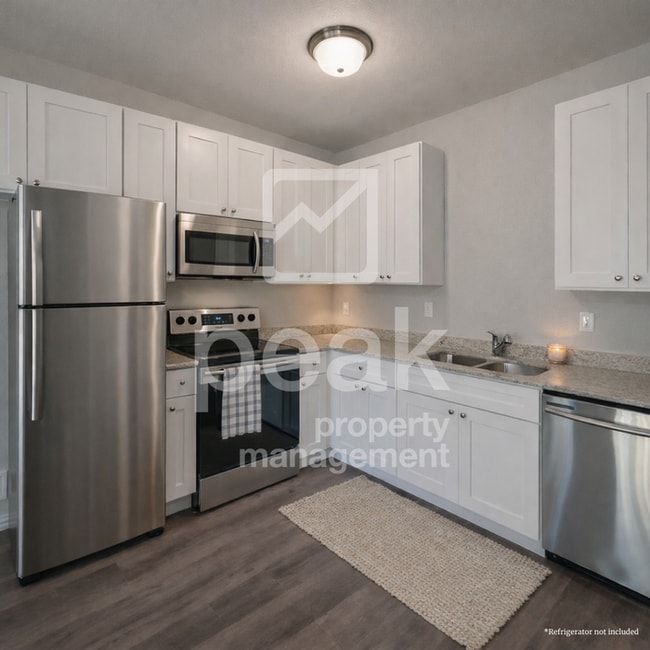 Building Photo - $1425! Stylish 2BR Townhome. Apply by 2/25 for 1425 free!