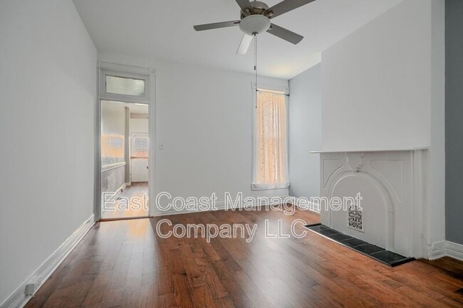 Building Photo - 717 W Lanvale St