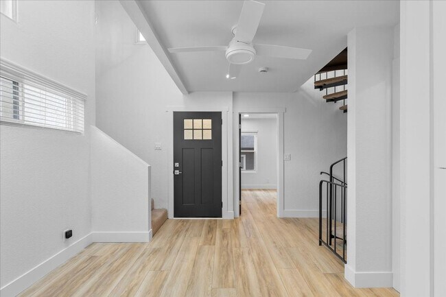 Building Photo - COMPLETELY REMODELED, BRIGHT & AIRY, TRI-LEVEL HOME W/ TOP-FLOOR GREAT ROOM LIVING SPACE, 2-CAR G...