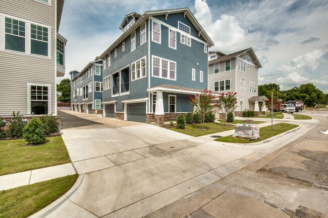 Building Photo - Welcome to a beautiful Craftsman-style Tow...