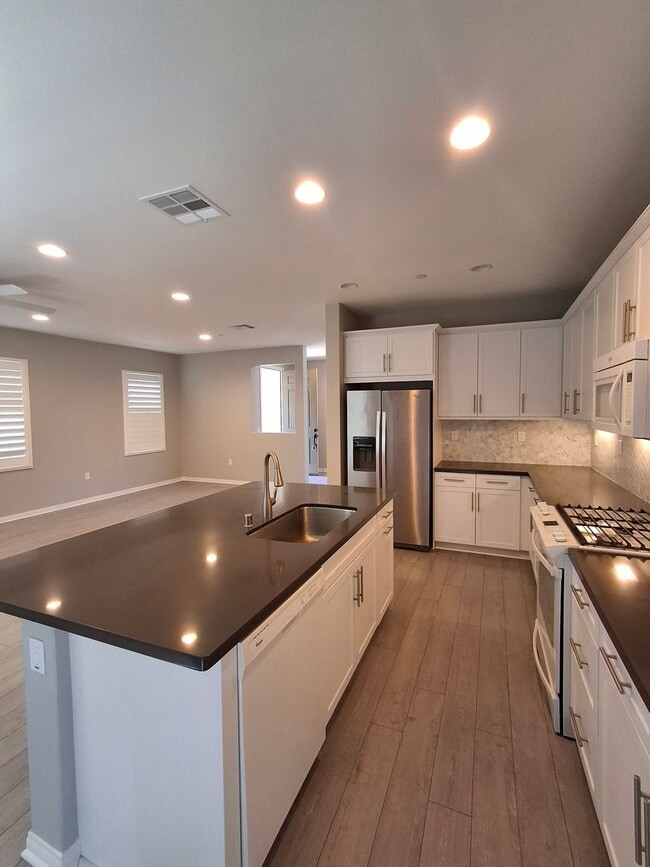 Building Photo - MUST SEE!!! Newer construction build w/ fixed SDGE Bill! Central A/C and Heat!