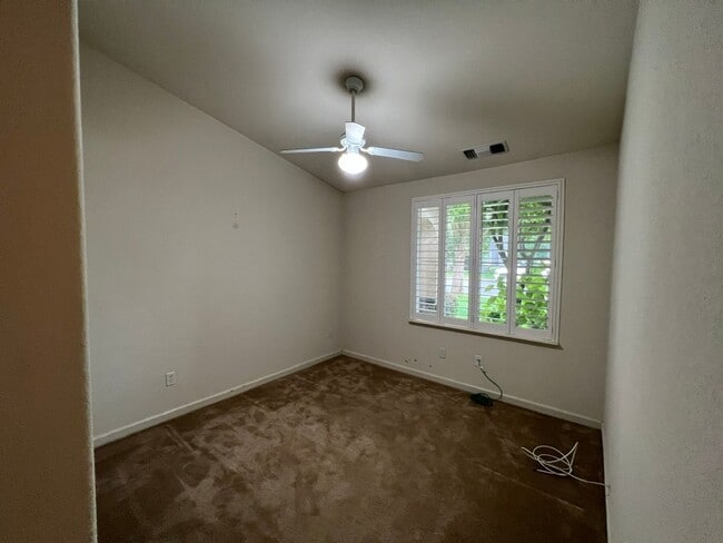 Building Photo - 4 bedrooms with 3 car garage in Rose Lane ...