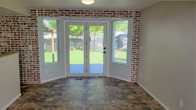 Building Photo - 3 Bedroom with large yard.