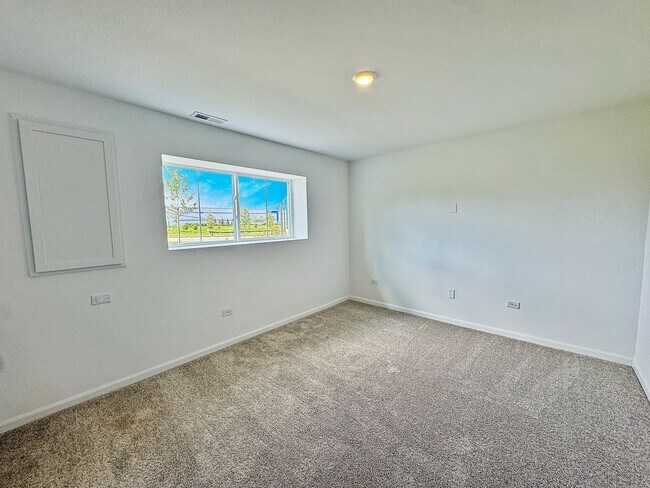 Building Photo - Step into modern living with this brand-ne...