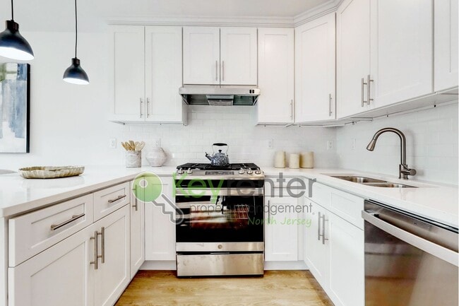 Building Photo - Brand New End-Unit 3-Bedroom Townhome with Garage, Driveway & EV Charger – First Occupancy!