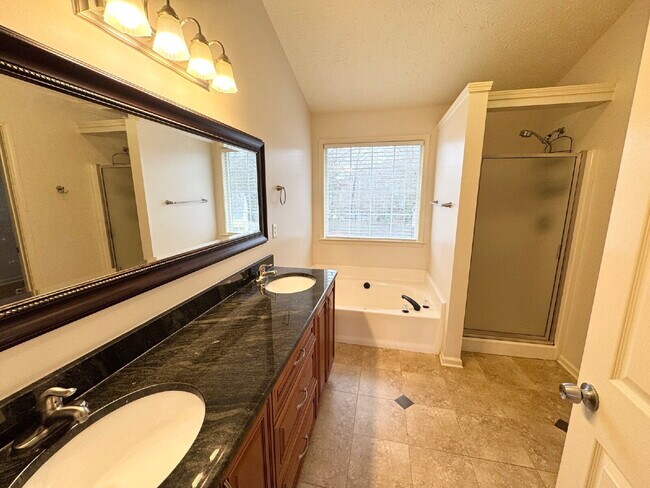 Building Photo - Rare Sugar Hill Rental with Huge Fenced Yard and Outdoor Living Space