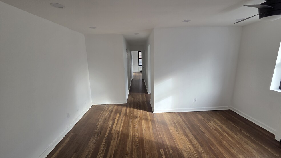 LR/DR with refinished hardwood floors - 165 Vroom St