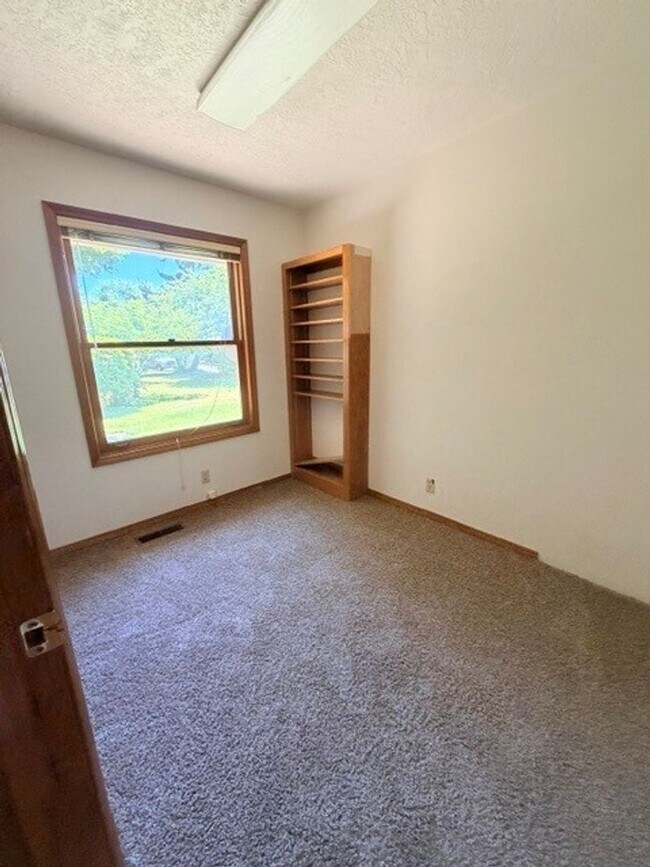 Building Photo - Charming 3-Bedroom Home with Garage & Lawn Care Included