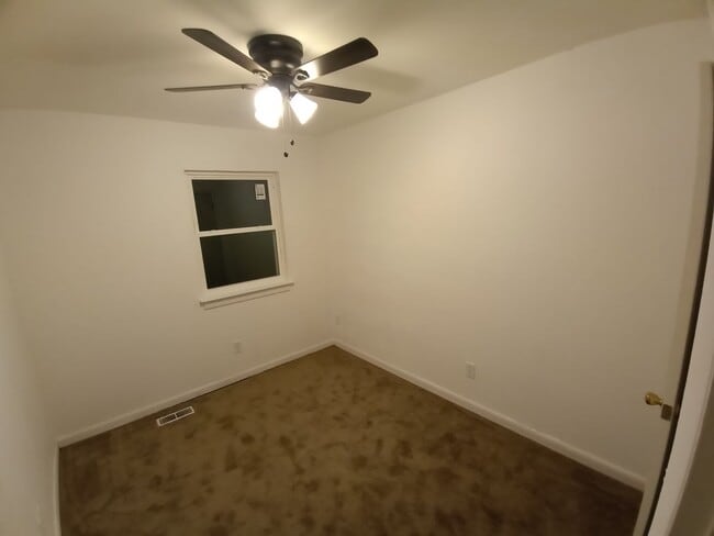 Building Photo - Three bedroom two and one half bath end unit townhome