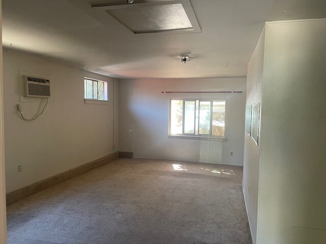 Bedroom 4 (with seperate bath pic above). Converted garage with private entry. - 1208 Cypress Ln