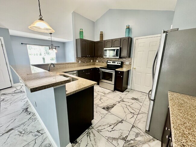 Building Photo - Three Bedroom Updated Single Level Home in...