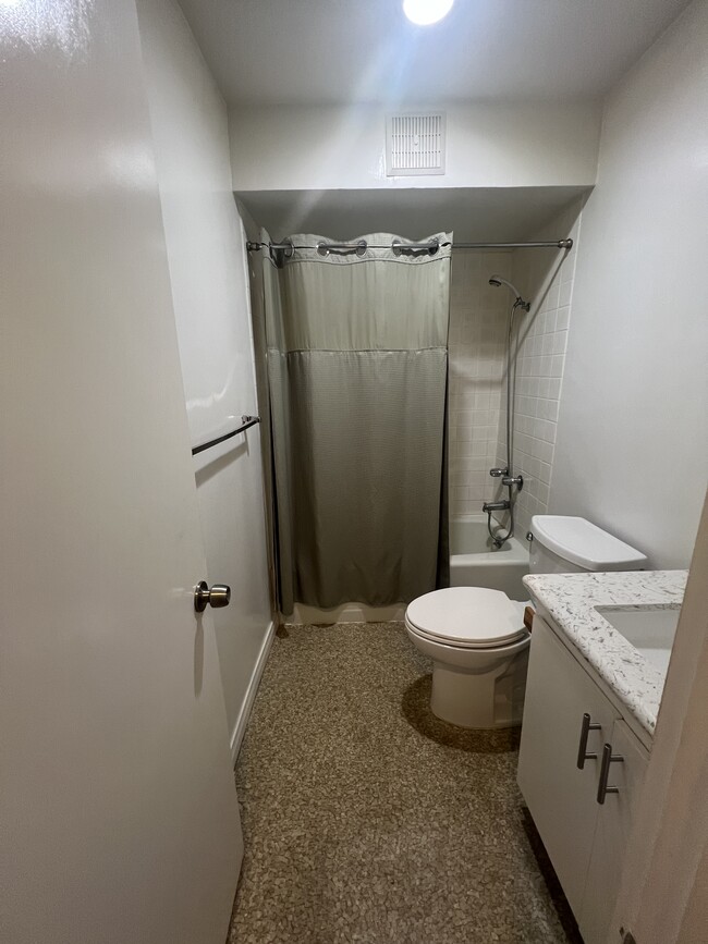 Bathroom with shower/tub combo - 6435 Green Valley Cir