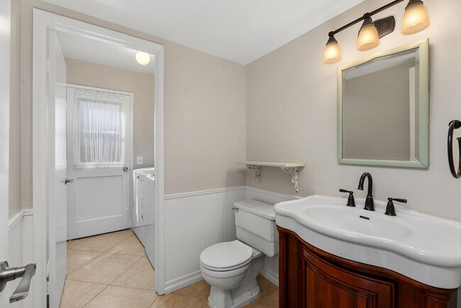 Building Photo - Coastal Elegance Meets Family Comfort in D...