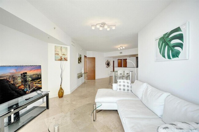 Building Photo - 16699 Collins Ave