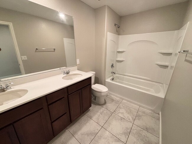 Building Photo - Stunning 3Bed/2Bath/2Car Townhome located in the N. Las Vegas/Tule Springs area!