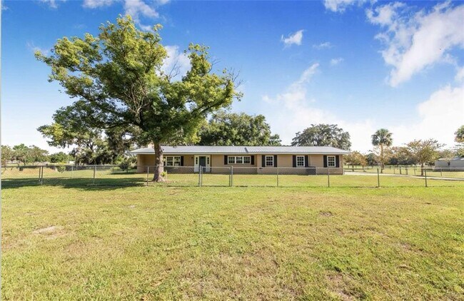 Building Photo - 4854 E Hinson Ave