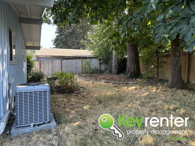 Building Photo - Beautiful 4-Bedroom Rambler in a Desirable...