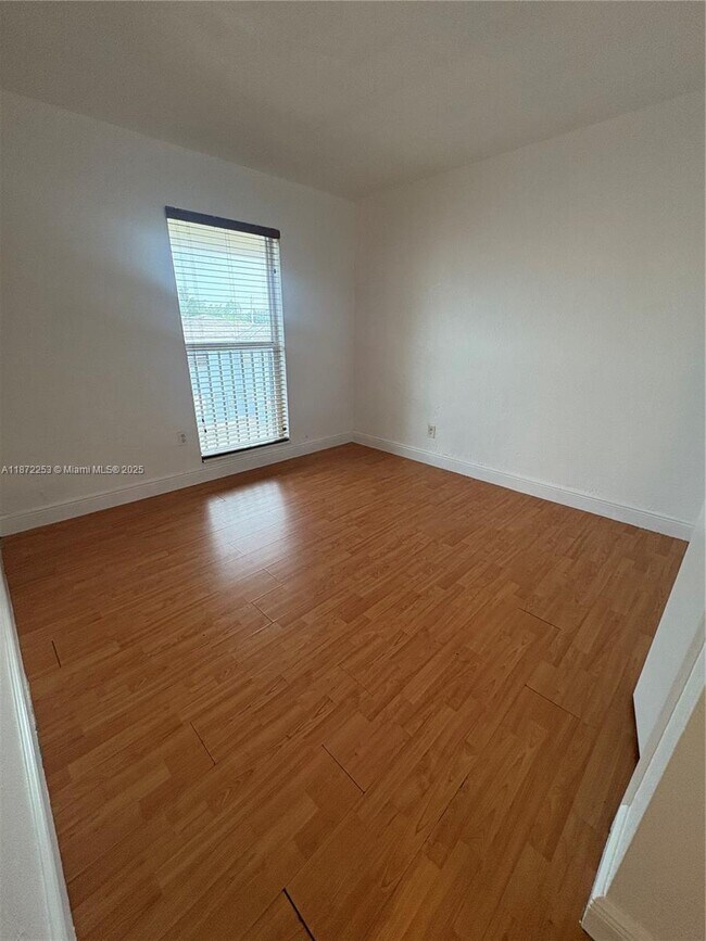 Building Photo - 241 S Royal Poinciana Blvd