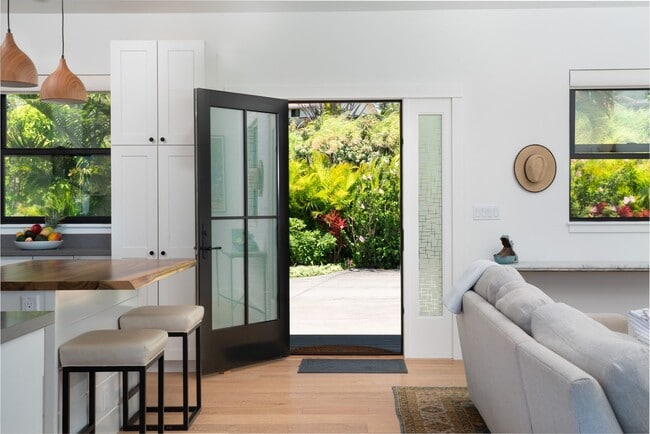 Building Photo - Elevated Haiku Retreat with Ocean Views, Designer Finishes & a Lush Edible Garden Sanctuary