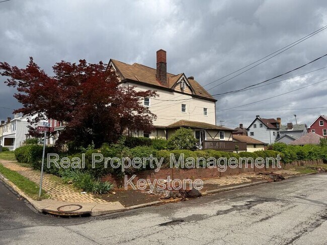 Building Photo - 705 E 18th Ave