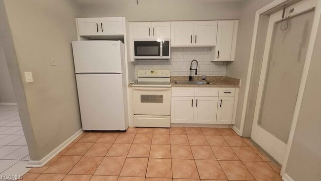 Building Photo - 221 Cape Coral Pkwy E