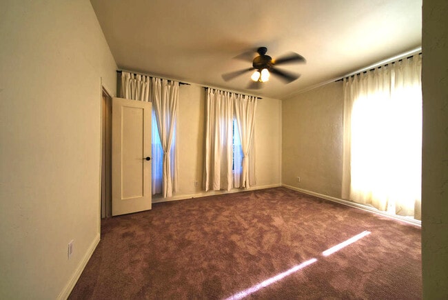 Carpet is actually a lighter beige than in pic. - 415 N Ogden Dr