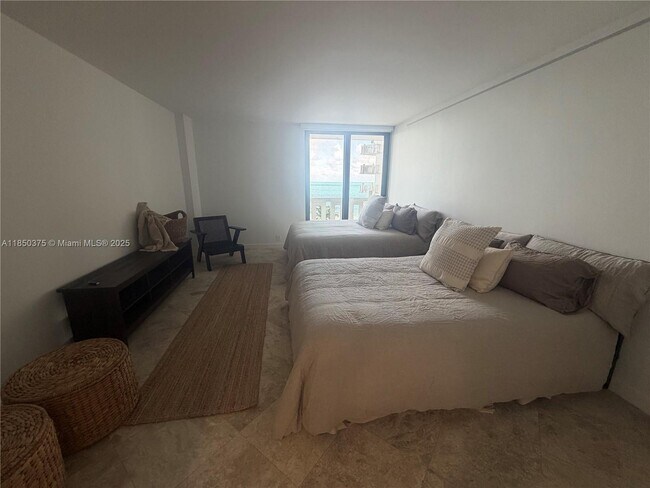 Building Photo - 1111 Crandon Blvd