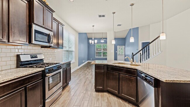 Building Photo - Spacious 4-Bedroom Home with a Backyard Oasis!