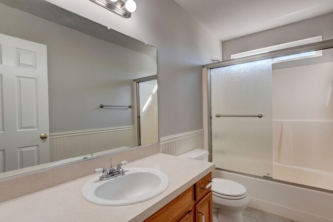 Building Photo - Spacious 4-Bedroom Home with Cozy Backyard...