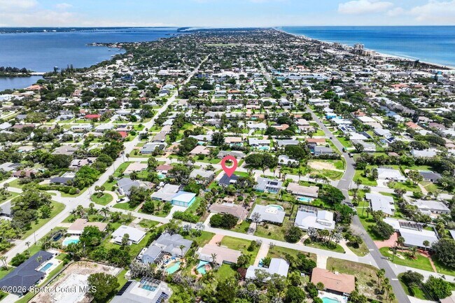 Building Photo - Welcome to this beautifully remodeled 4-bedroom, 3-bath home in the heart of Indialantic Beach!